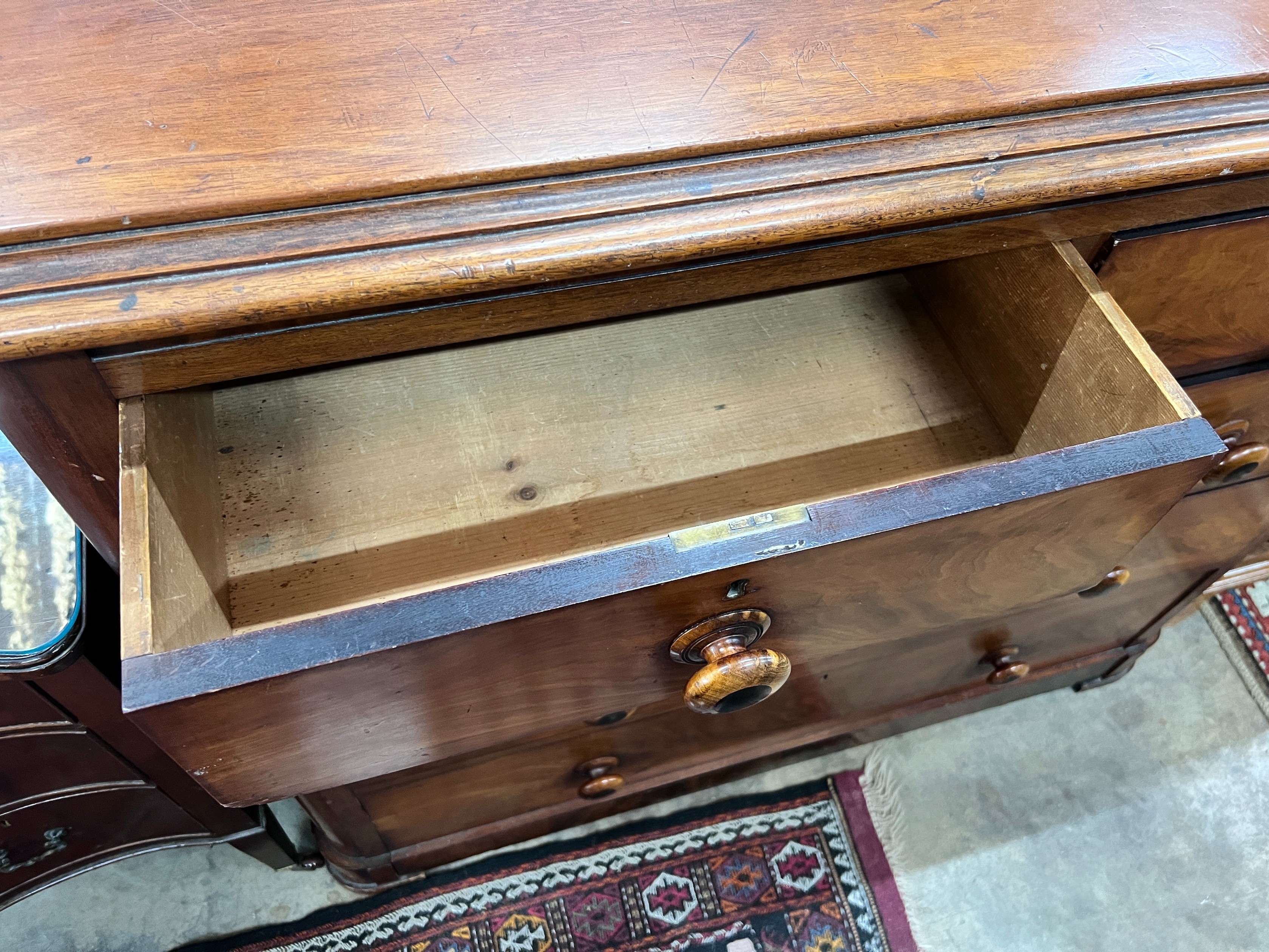 A mahogany chest of drawers, width 130cm, depth 59cm, height 112cm *Please note the sale commences at 9am.